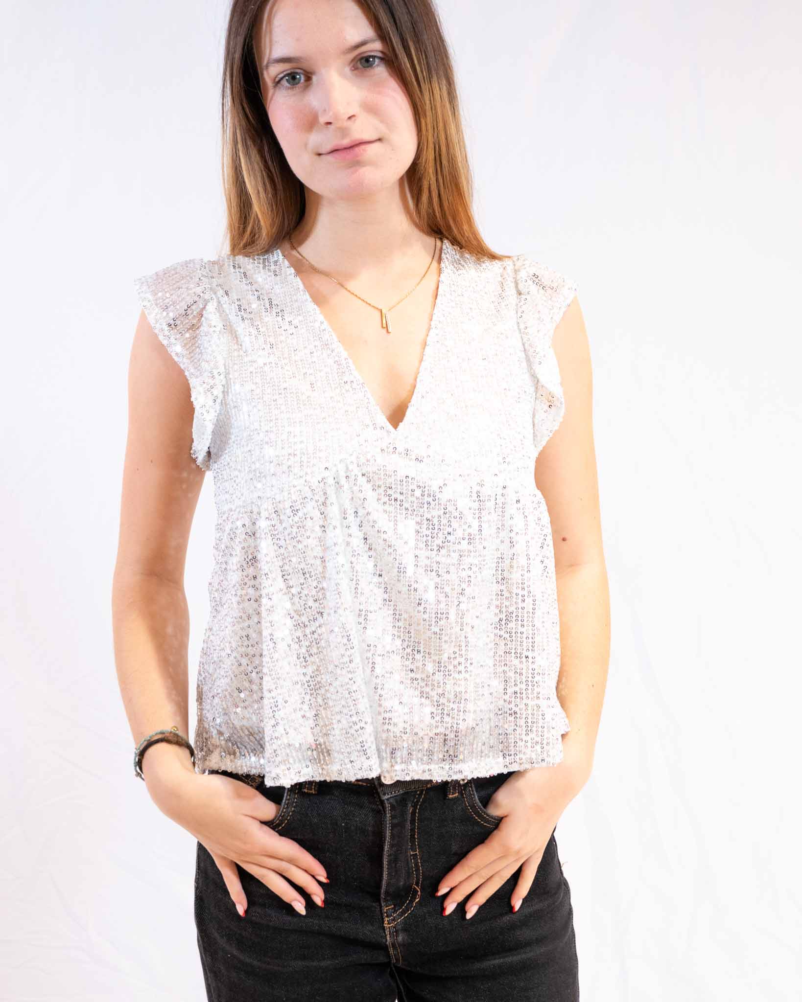 Top à sequins blanc – glow soft & chic