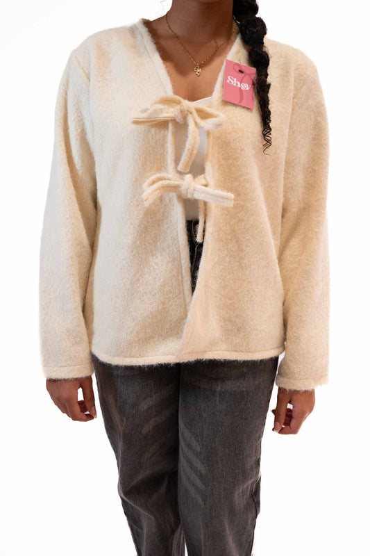 Veste a nœud blanche