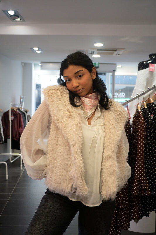 Veste moumoute sans manches