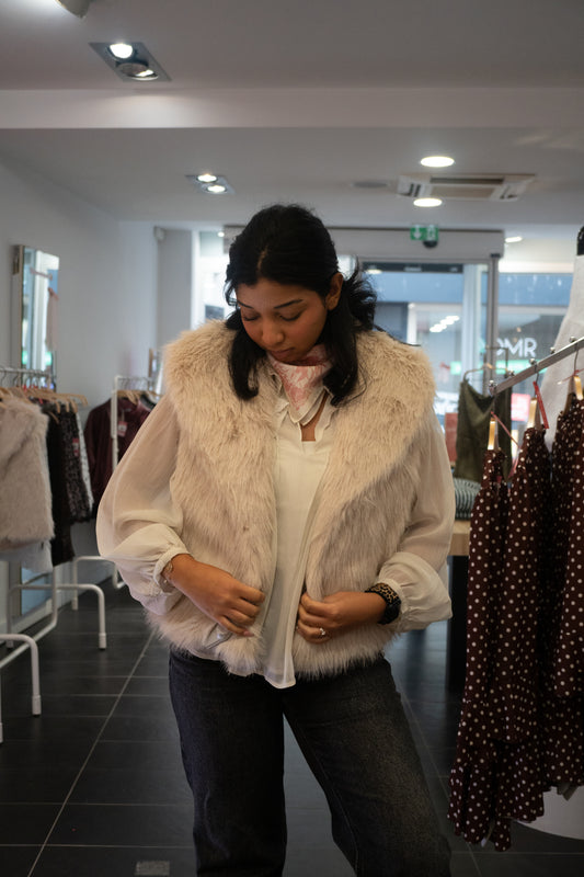 Veste moumoute sans manches